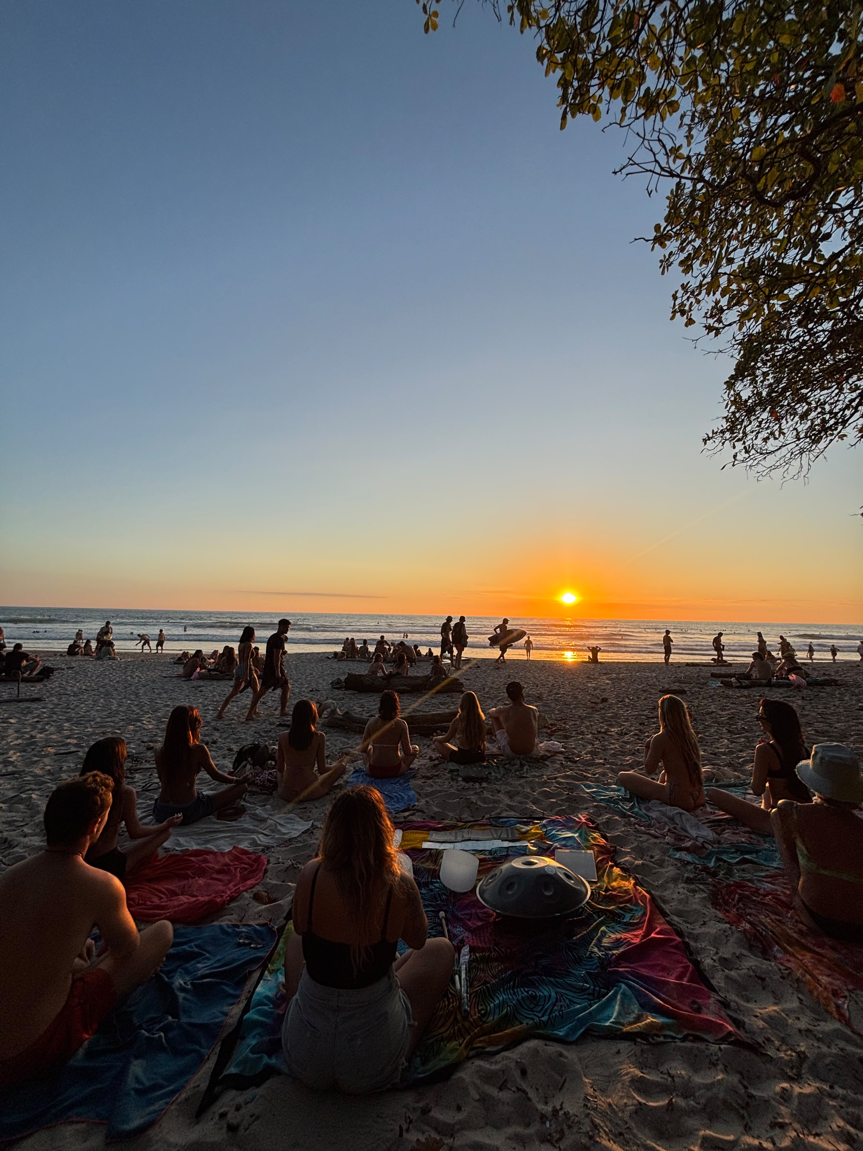 Sound healing ceremony at sunset